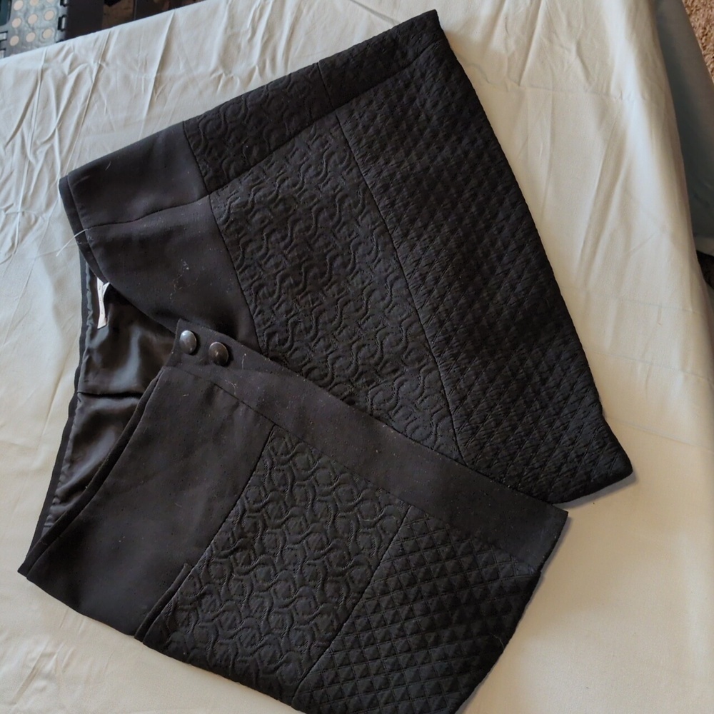Boost Your Style with CAbi's Textured Asymmetrical Mini Skirt